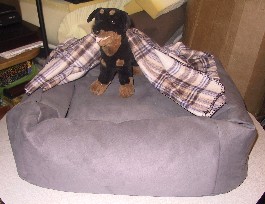Heavy weight gray microsuede with a soft plaid fleece snuggle cover